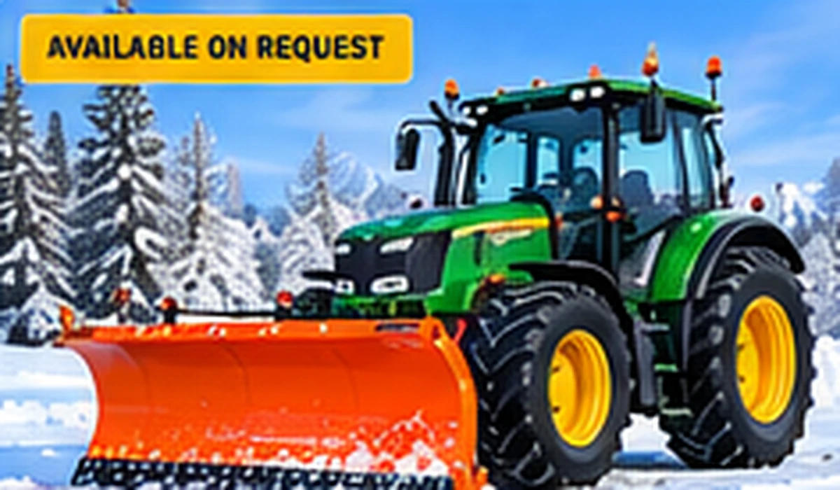 Compact tractor with snow blade